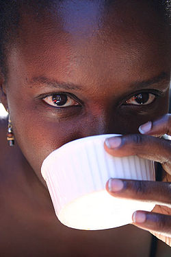 A Kenyan woman drinking