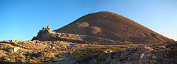 The man-made peak of Mount Nemrut with statues of gods and the assumed tomb of King Antiochus Theos of Commagene