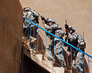 Soldiers from 1-30 Infantry, 2nd BCT, 3rd ID clear a house in Arab Jabour