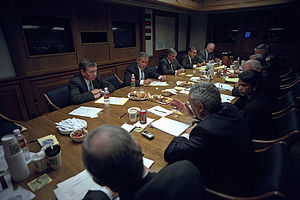 After addressing the nation, President George W. Bush meets with his National Security Council.jpg