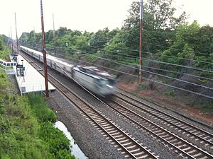 Amtrak through Churchmans Crossing.jpg