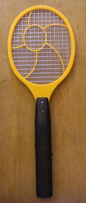 a yellow tennis racket like device with metal wires instead of threads,to electrocute bugs