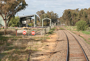 Looking south, loop siding and fertiliser depot to left, platform mound to right