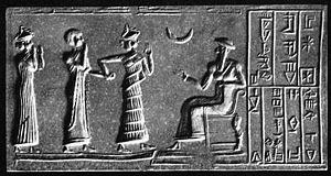 Ur-Nammu (seated) bestows governorship on Ḫašḫamer, ensi of Iškun-Sin (cylinder seal impression, ca. 2100 BC).