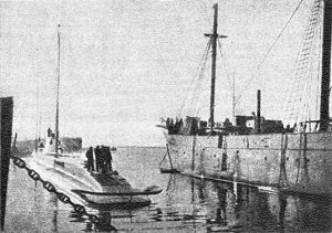 ORP Żbik next to the training sailship Lwów