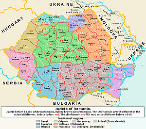 Outline showing the territory of present Romania and its into counties superimposed over the colored map of the inter-war counties.
