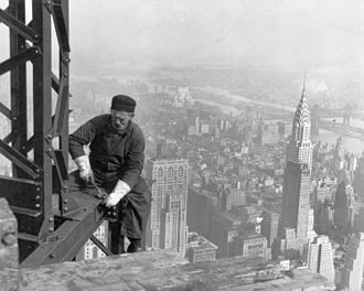 A workman on the framework of the Empire State Building during its construction