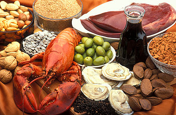  Image illustrating rich and good nutritional sources of copper including: oysters, beef or lamb liver, Brazil nuts, blackstrap molasses, cocoa, and black pepper, lobster, nuts and sunflower seeds, green olives, and wheat bran.