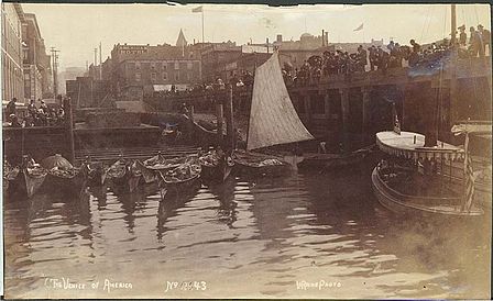 Seattle waterfront with moored Indian canoes, Seattle, c. 1892