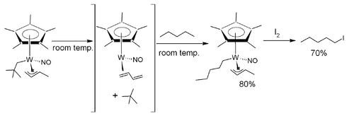 C−H activation of pentane, as seen in Ledgzdins et al., J. Am. Chem. Soc. 2007, 129, 5372–3.