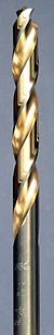 A steel colored twist drill bit with the spiral groove colored in a golden shade.