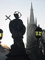 Brugge statue and church.JPG