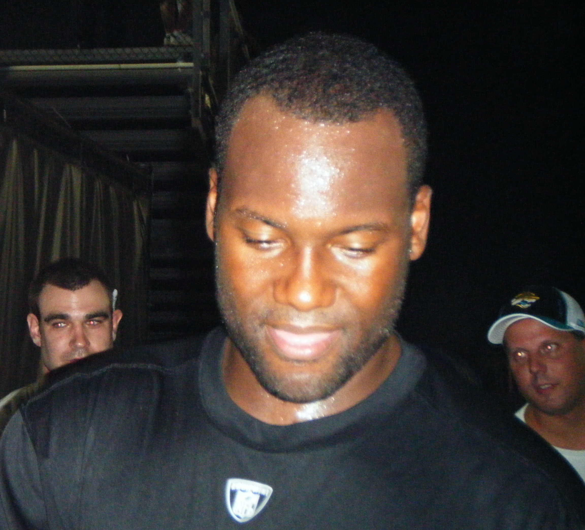 Jaguars #9 quarterback David Garrard tackled by Jets #30 Drew Coleman  before he can get the